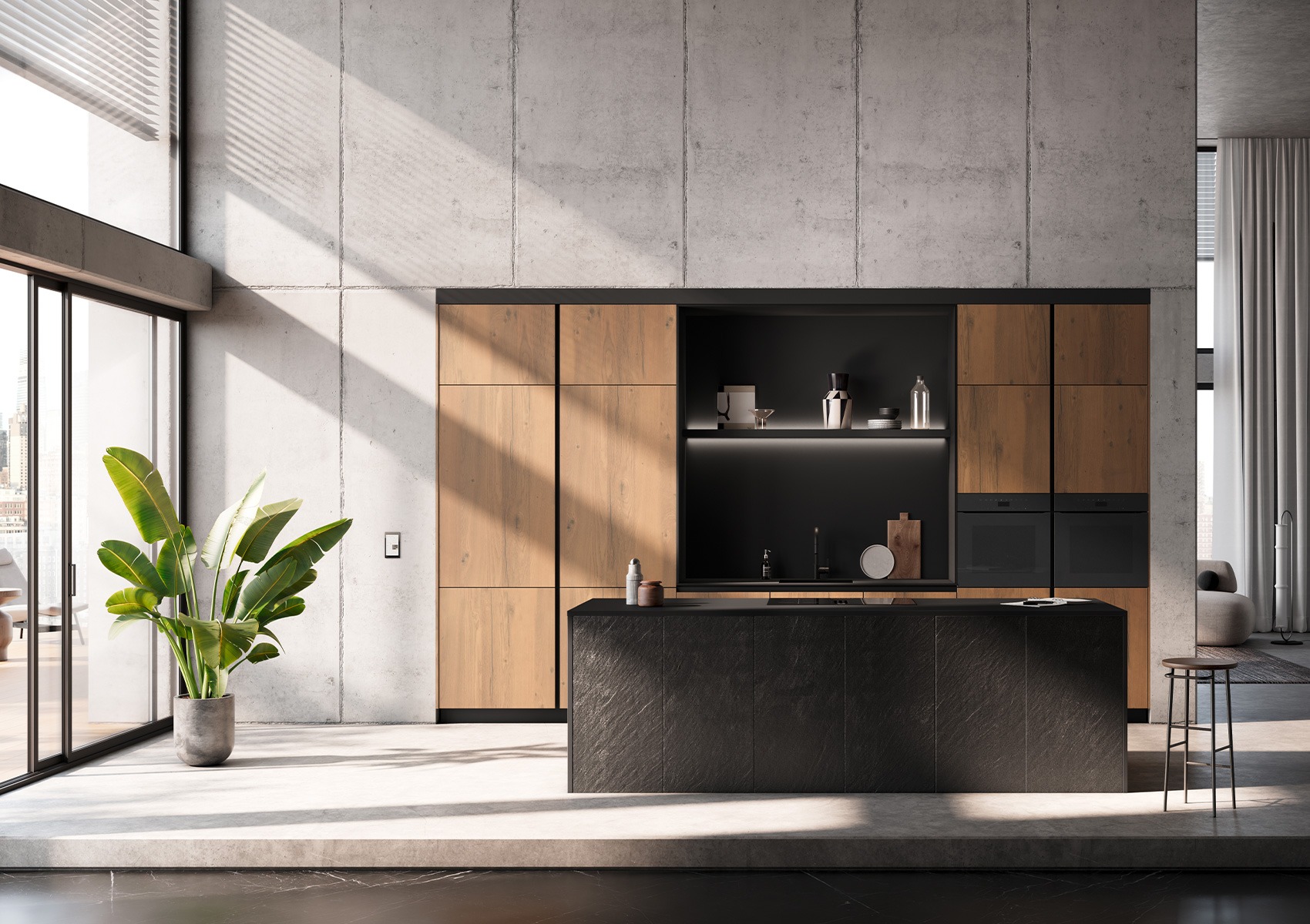 cuisine_contemporaine_ouverte_sur_mesure_avec_plaque_sur_ilot_noir_kuchenart_cuisiniste